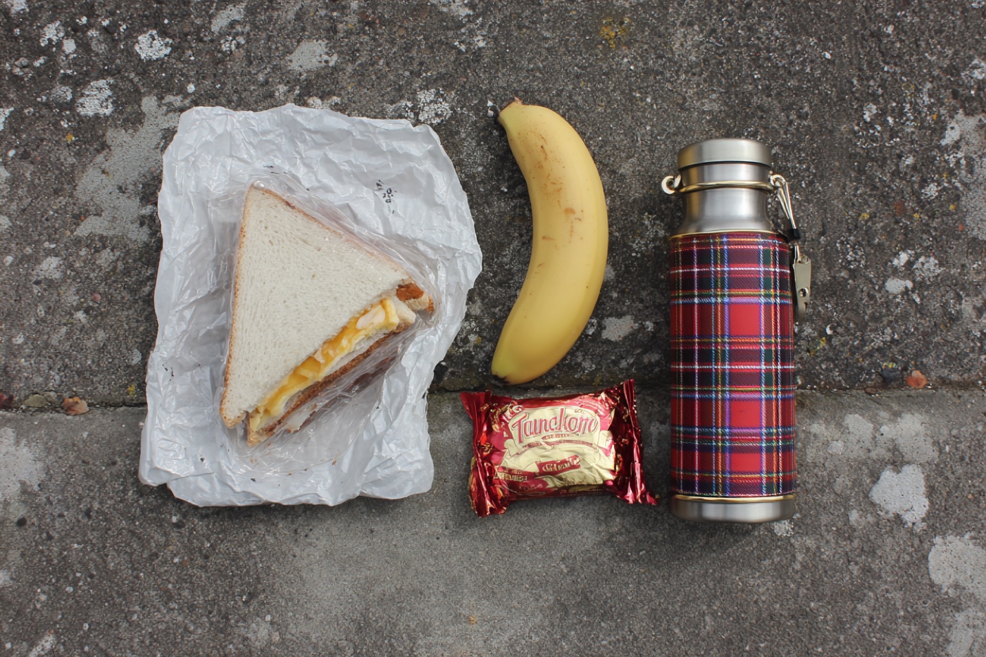 Provisions — cheese sandwich, banana, Tunnock's, flask